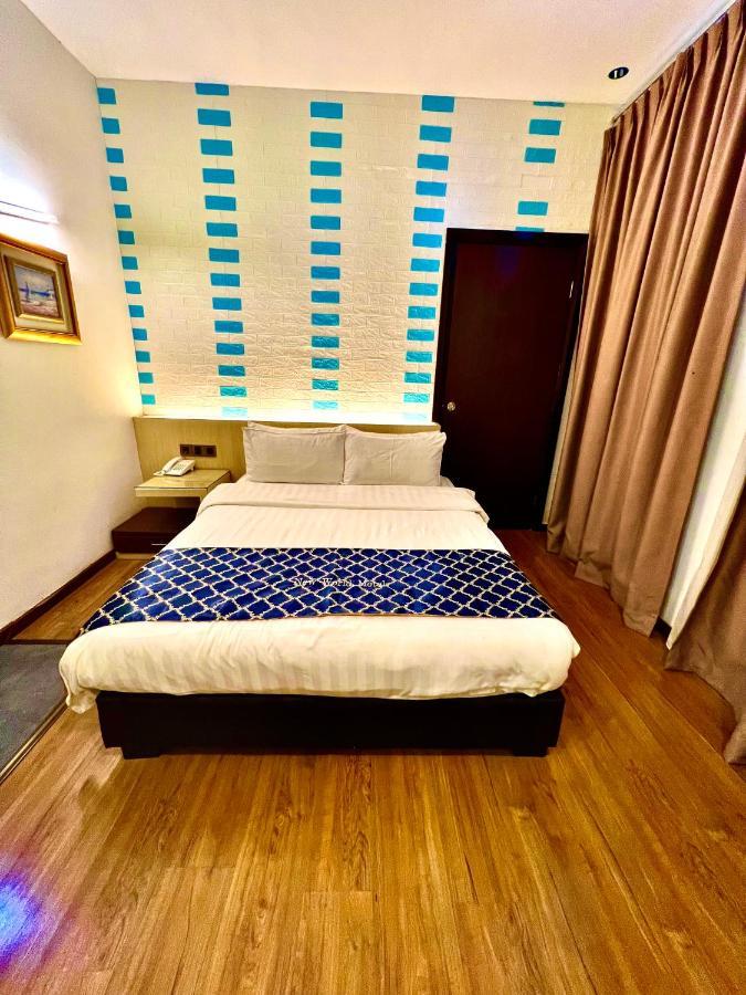 New World Express Motel Bintulu Buitenkant foto