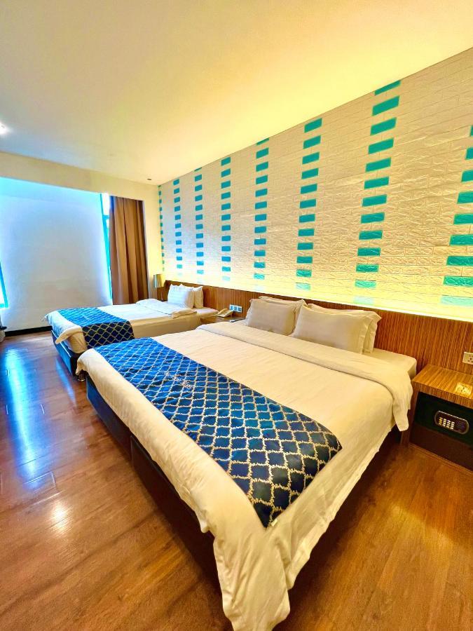 New World Express Motel Bintulu Buitenkant foto